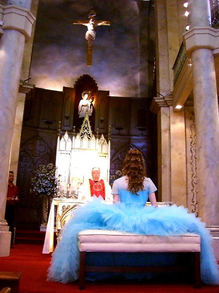 <img typeof="foaf:Image" src="http://statelibrarync.org/learnnc/sites/default/files/images/05infrontofthealtar.JPG" width="768" height="1024" alt="Quinceañera at the altar" title="Quinceañera at the altar" />