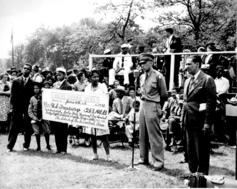 Presenting a check for war bonds Presenting a check for war bonds