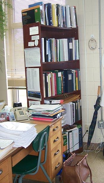 <img typeof="foaf:Image" src="http://statelibrarync.org/learnnc/sites/default/files/images/behinddesk1.jpg" width="350" height="611" alt="Bookcases" title="Bookcases" /> <img typeof="foaf:Image" src="http://statelibrarync.org/learnnc/sites/default/files/images/behinddesk1.jpg" width="350" height="611" alt="Bookcases" title="Bookcases" />