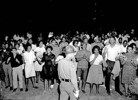 Group of African American protesters chanting and clapping on the lawn of the Executive Mansion in Raleigh, North Carolina (1963) This is a group of African American protesters chanting and clapping on the lawn of the Executive Mansion in Raleigh