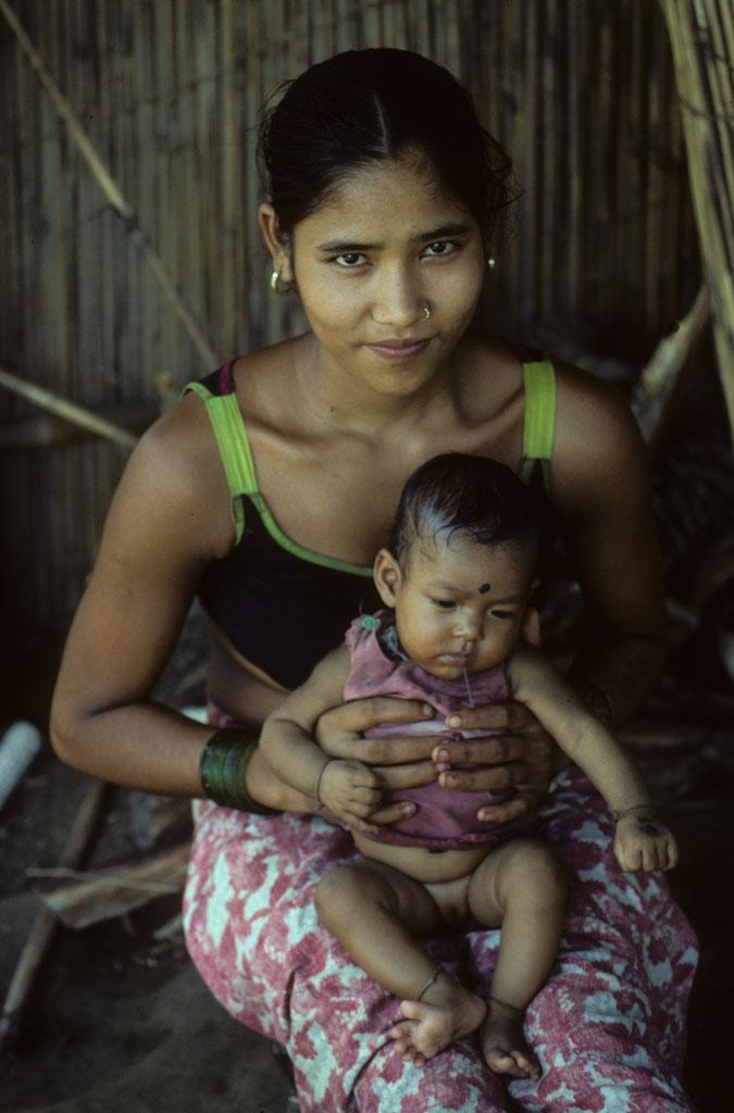 <img typeof="foaf:Image" src="http://statelibrarync.org/learnnc/sites/default/files/images/nepal_048.jpg" width="675" height="1024" alt="Nepalese woman with her child " title="Nepalese woman with her child " /> <img typeof="foaf:Image" src="http://statelibrarync.org/learnnc/sites/default/files/images/nepal_048.jpg" width="675" height="1024" alt="Nepalese woman with her child " title="Nepalese woman with her child " />