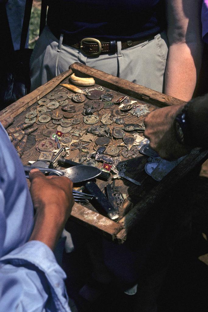 <img typeof="foaf:Image" src="http://statelibrarync.org/learnnc/sites/default/files/images/vietnam_084.jpg" width="683" height="1024" alt="Tray filled with military badges and other artifacts from the Vietnam wars" title="Tray filled with military badges and other artifacts from the Vietnam wars" /> <img typeof="foaf:Image" src="http://statelibrarync.org/learnnc/sites/default/files/images/vietnam_084.jpg" width="683" height="1024" alt="Tray filled with military badges and other artifacts from the Vietnam wars" title="Tray filled with military badges and other artifacts from the Vietnam wars" />