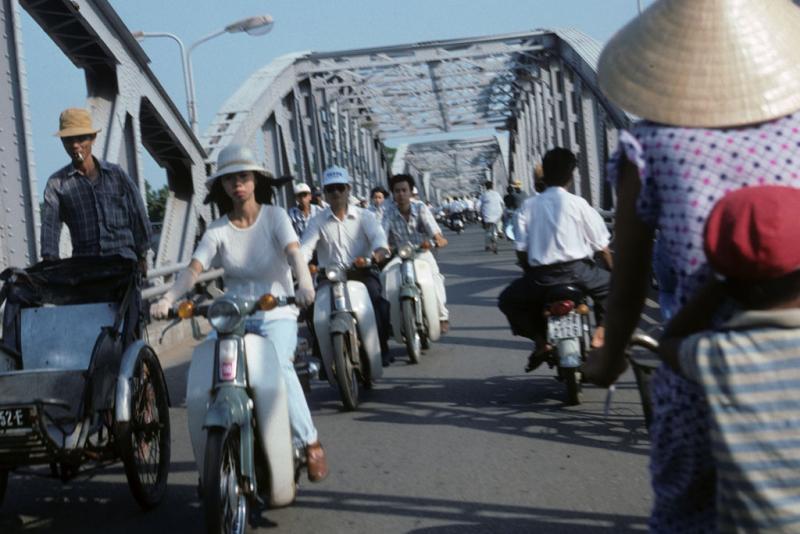 <img typeof="foaf:Image" src="http://statelibrarync.org/learnnc/sites/default/files/images/vietnam_101.jpg" width="1024" height="683" alt="Motorcycle and bycycle traffic crossing bridge at Hue" title="Motorcycle and bycycle traffic crossing bridge at Hue" /> <img typeof="foaf:Image" src="http://statelibrarync.org/learnnc/sites/default/files/images/vietnam_101.jpg" width="1024" height="683" alt="Motorcycle and bycycle traffic crossing bridge at Hue" title="Motorcycle and bycycle traffic crossing bridge at Hue" />